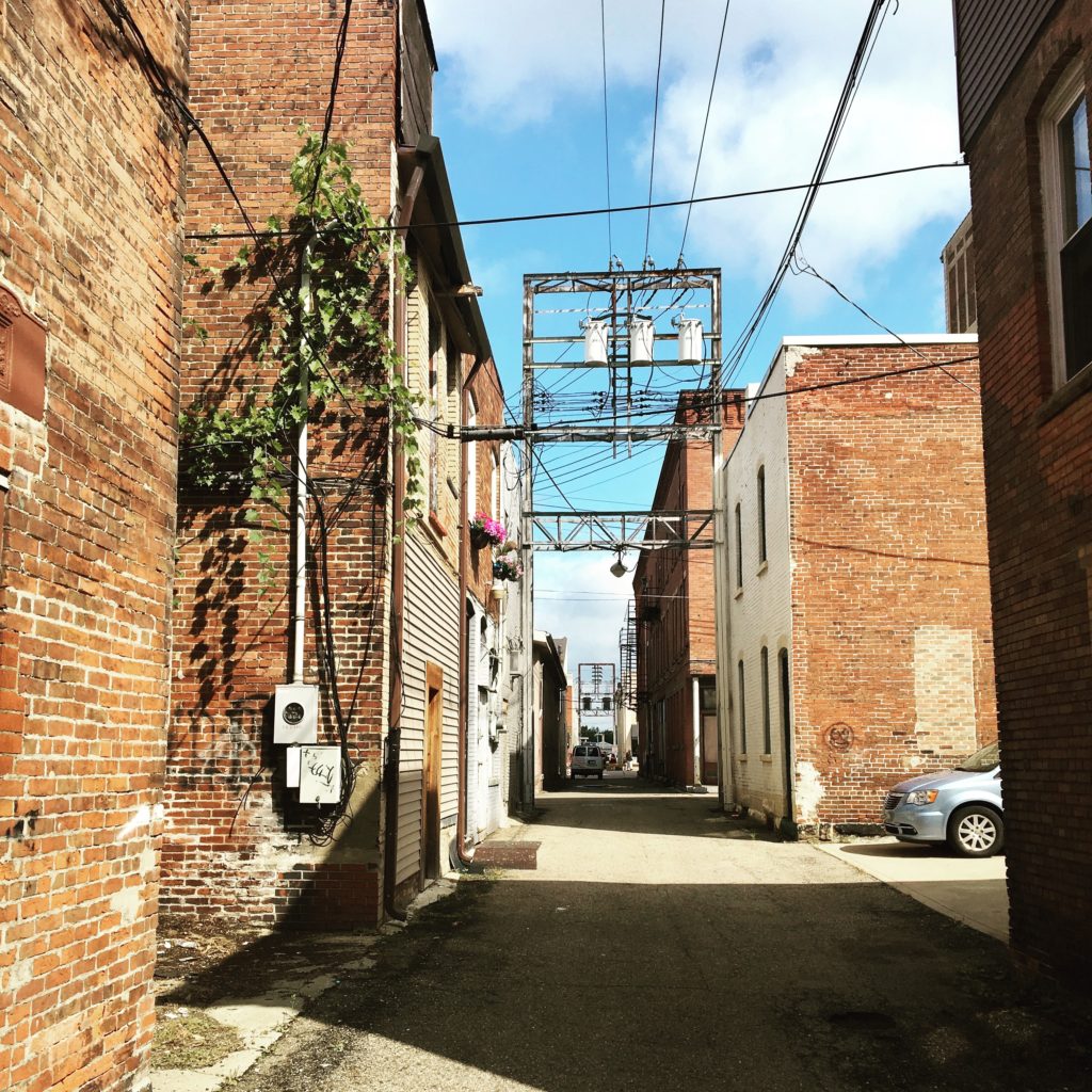 I'm sure some therapist out there would be able to explain why I love alleys. I'll be honest, I don't really care why. I love taking photos of them.