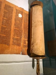 A Torah written on animal skins. For preservation, it has to be rolled and turned every so often to make sure the skins don't crack.